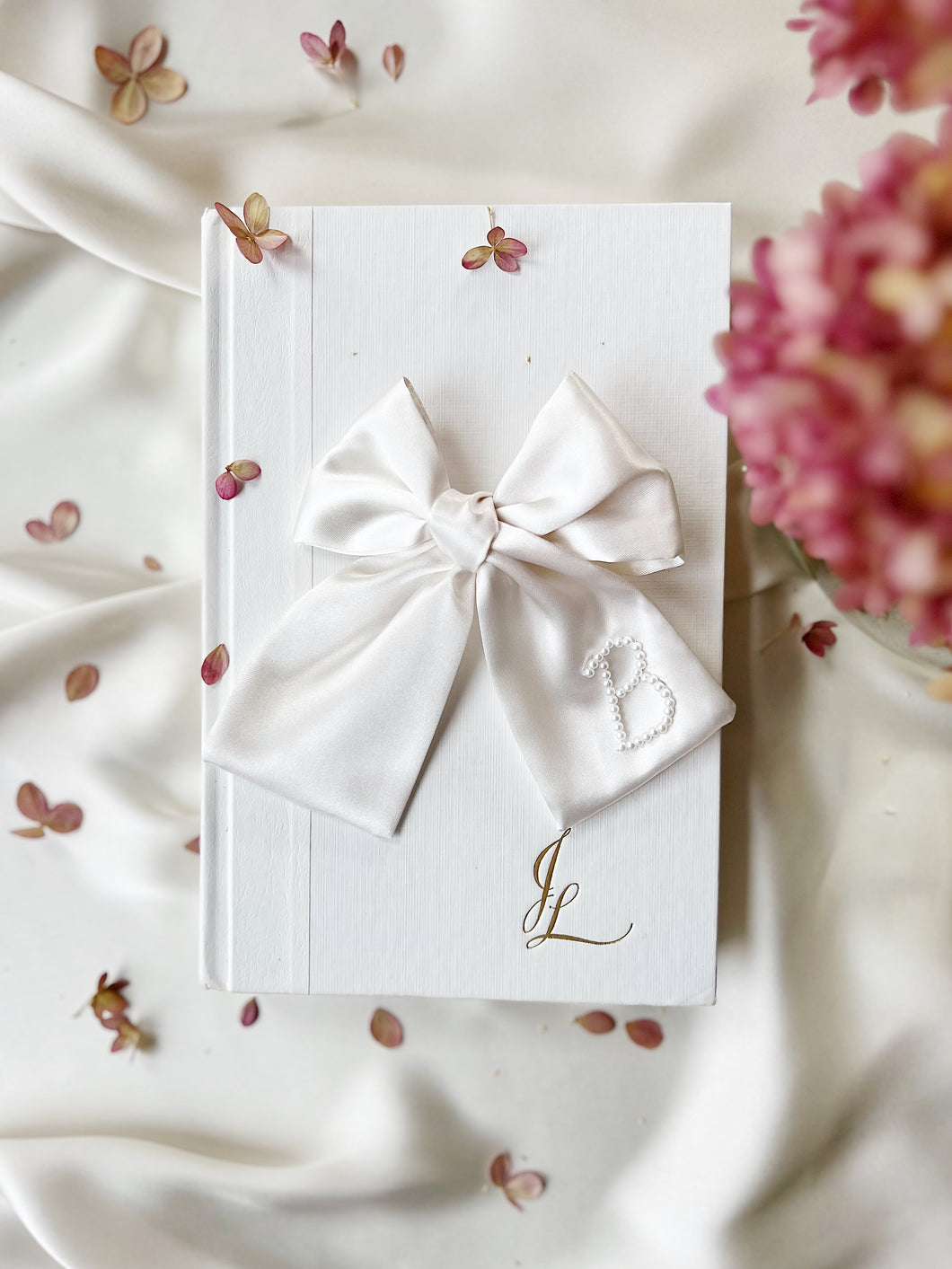 Letter B ivory bow