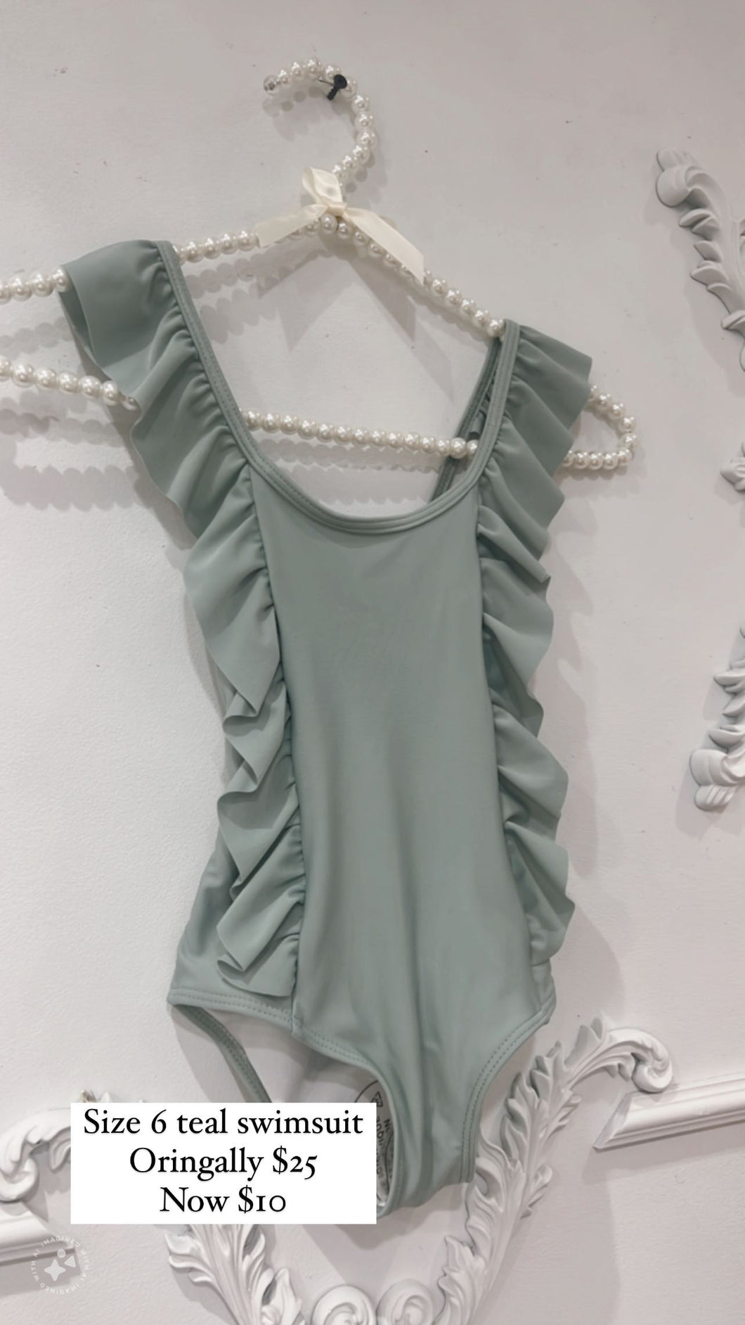 Teal swimsuit size 6