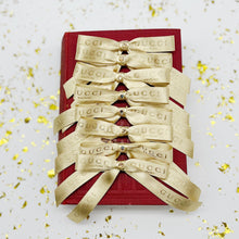 Load image into Gallery viewer, Authentic Gold Medium Gucci Ribbon Clip
